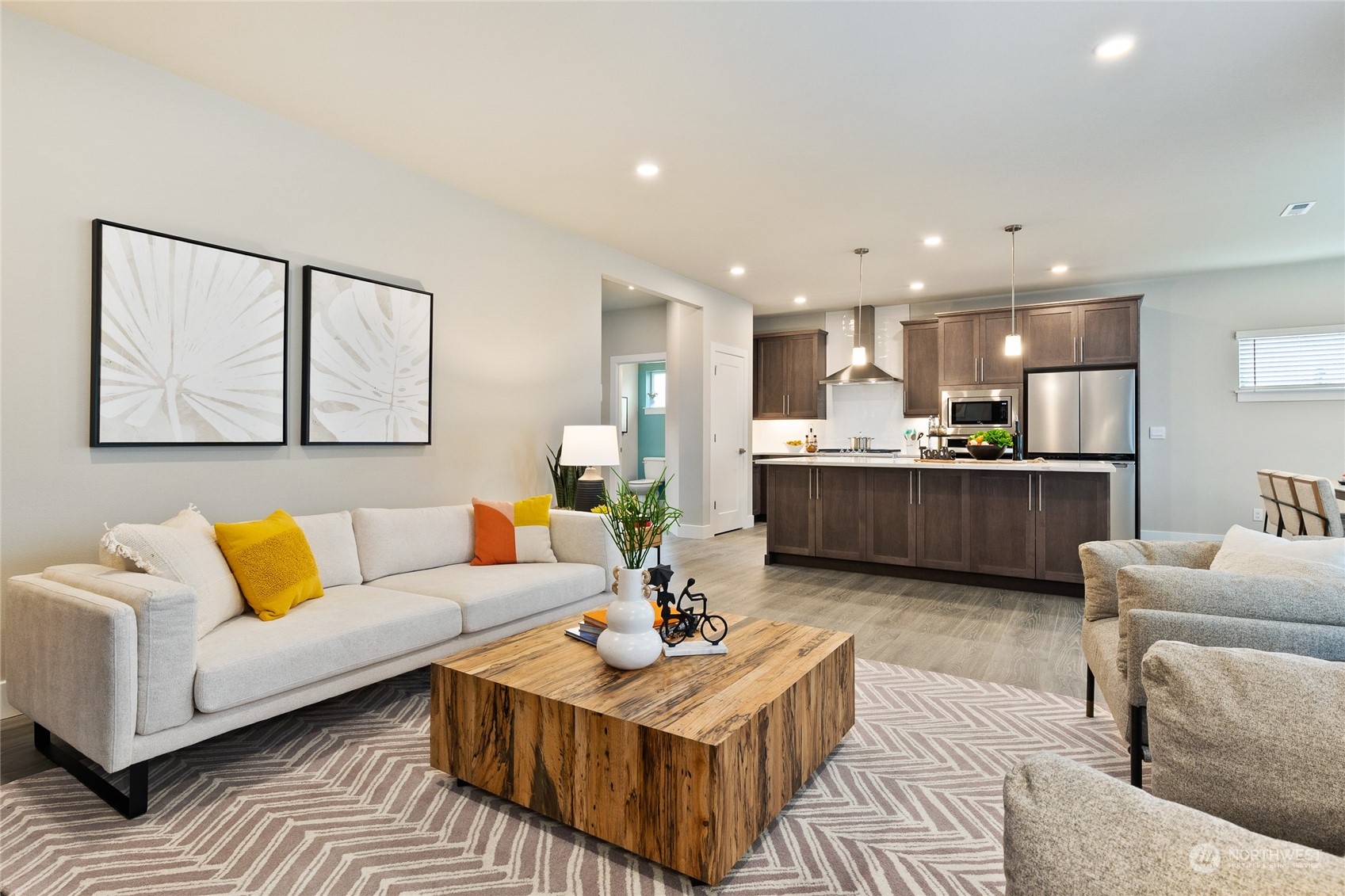 15 177th St S West, Unit IW 15 Bothell, WA 98012 - Photo 16 of 29 a living room with furniture kitchen view and a couch