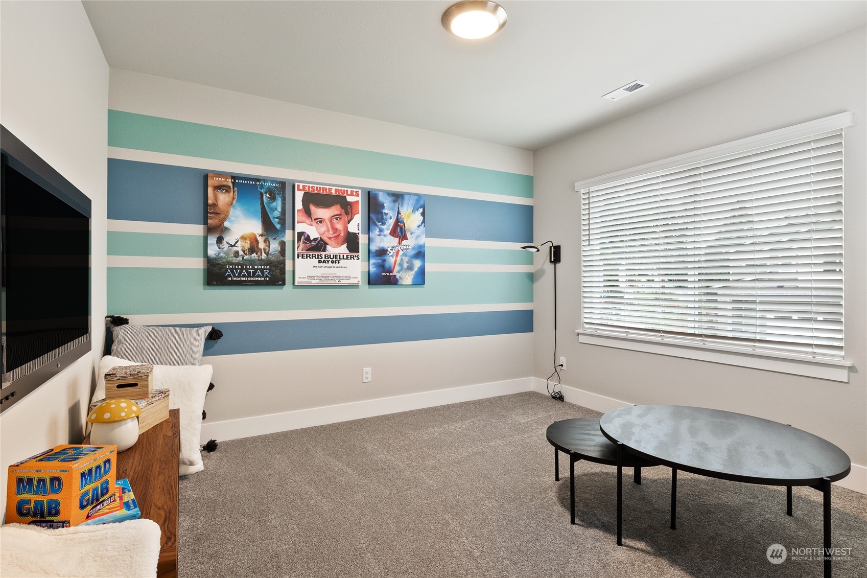 15 177th St S West, Unit IW 15 Bothell, WA 98012 - Photo 18 of 29 a living room with furniture and a flat screen tv