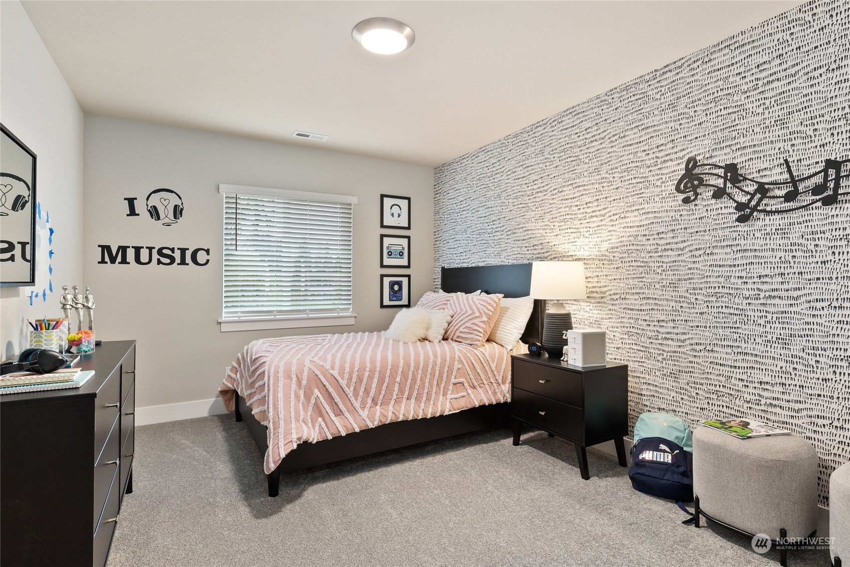 15 177th St S West, Unit IW 15 Bothell, WA 98012 - Photo 24 of 29 a bed room with a bed and a couch