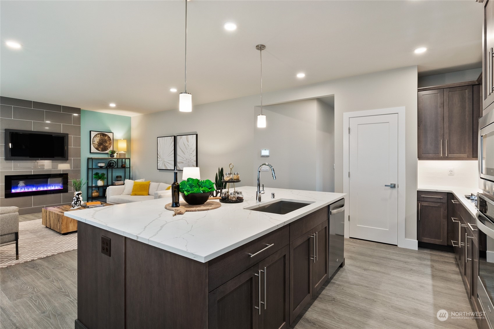 15 177th St S West, Unit IW 15 Bothell, WA 98012 - Photo 9 of 29 a kitchen with stainless steel appliances a sink and a refrigerator