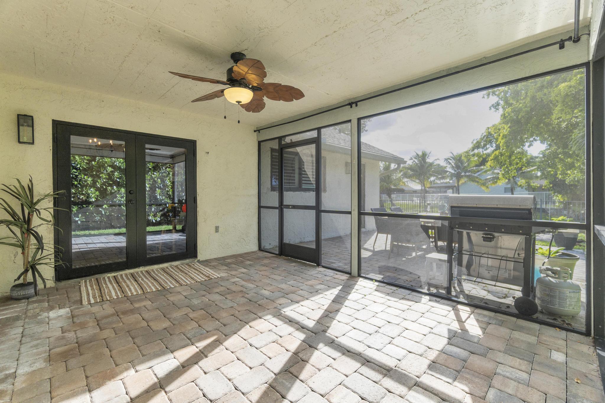 22489 Swordfish Drive Boca Raton, FL 33428 - Photo 26 of 31 Screened Patio