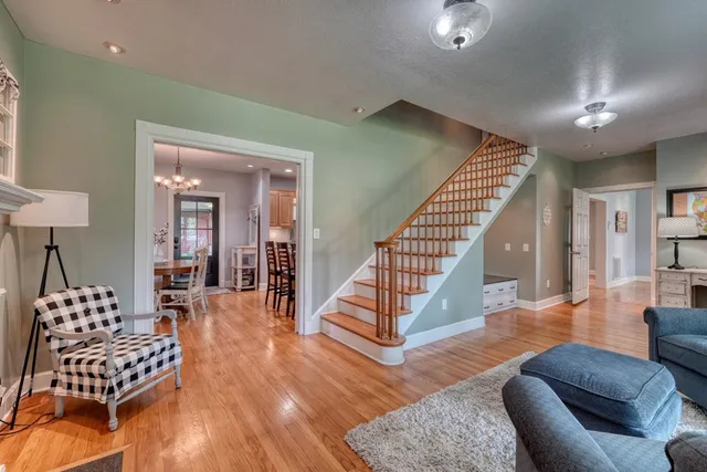 a kitchen with a sink a stove and cabinets