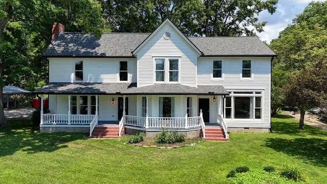 a house that has garden in front of it