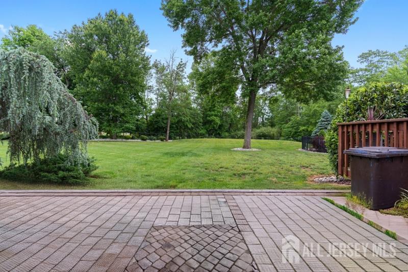 526 County Road, Unit 579 Ringoes, NJ 08551 - Photo 34 of 51 a view of a garden with wooden deck