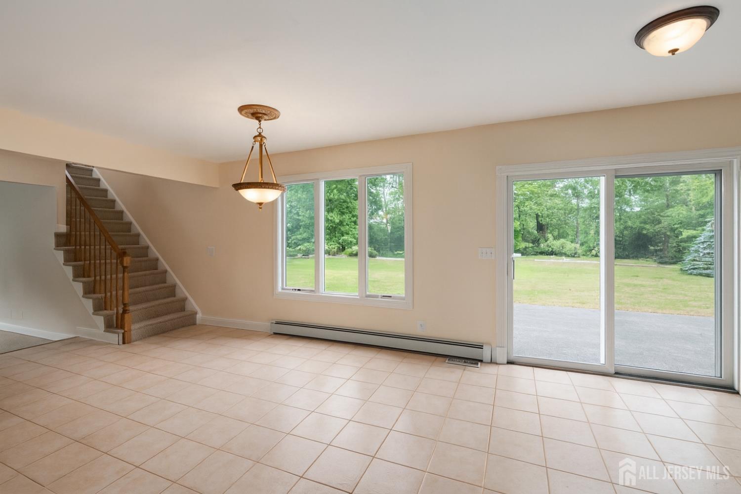 526 County Road, Unit 579 Ringoes, NJ 08551 - Photo 39 of 51 a view of an empty room with windows