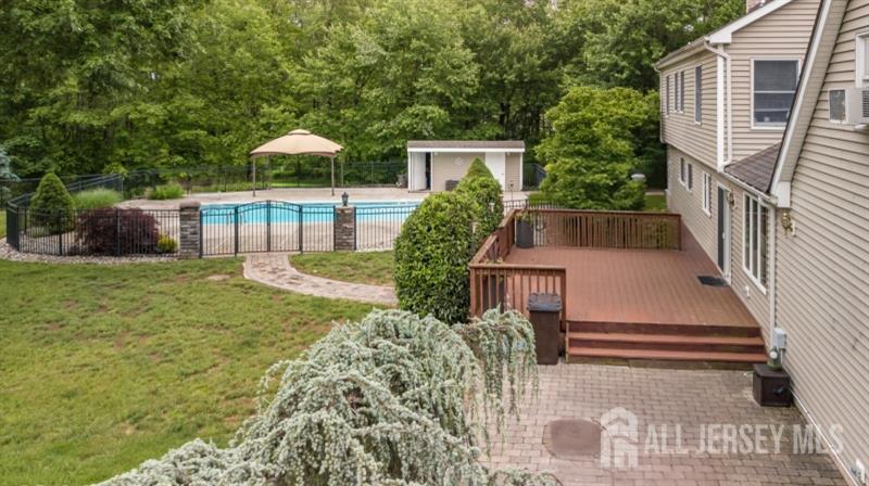 526 County Road, Unit 579 Ringoes, NJ 08551 - Photo 48 of 51 a view of a house with backyard and sitting area