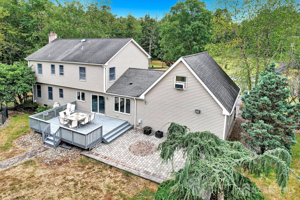 526 County Road, Unit 579 Ringoes, NJ 08551 - Photo 10 of 51 a aerial view of a house with a yard patio and backyard