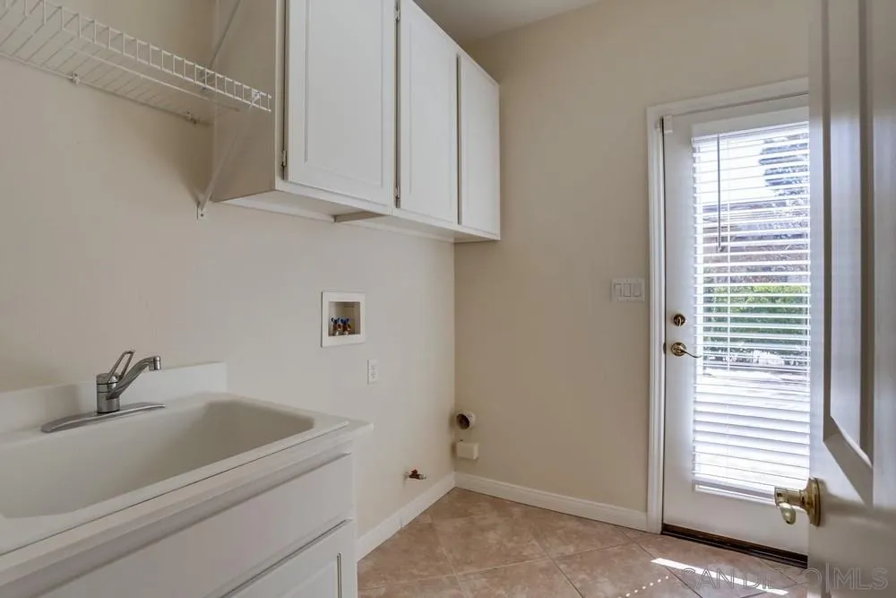 710 Greyfield Court Fallbrook, CA 92028 - Photo 15 of 28 a bathroom with a sink and vanity