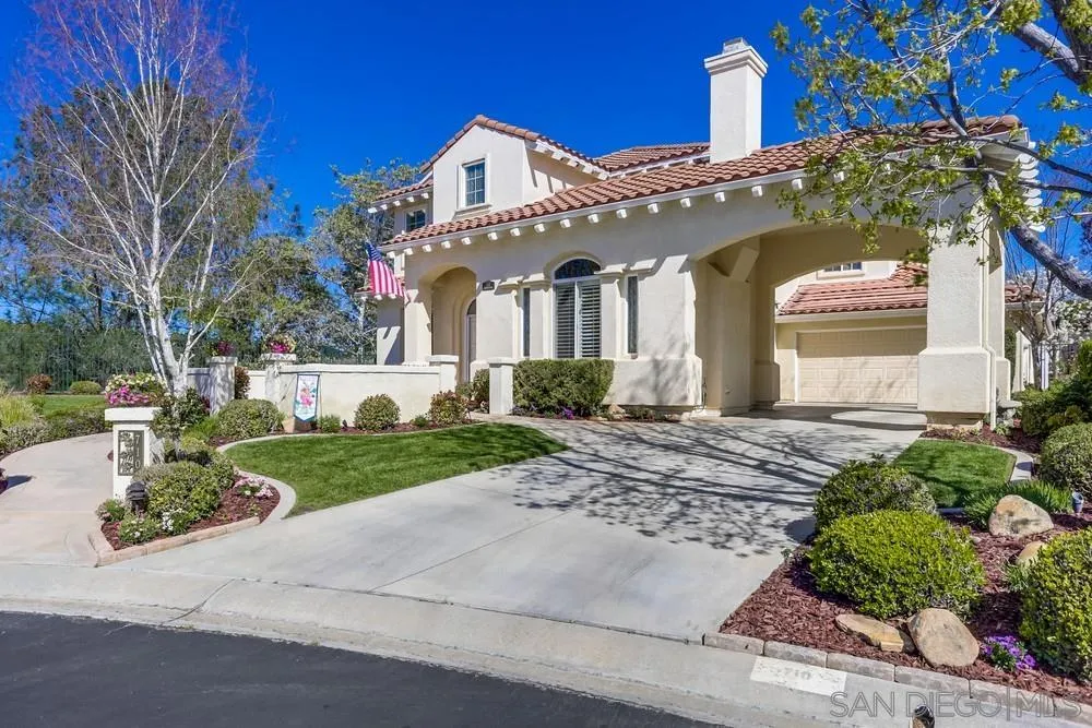 710 Greyfield Court Fallbrook, CA 92028 - Photo 2 of 28 a front view of a house with garden