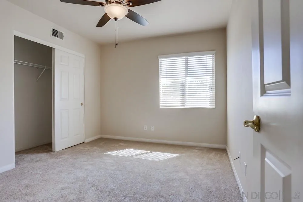 710 Greyfield Court Fallbrook, CA 92028 - Photo 21 of 28 a view of an empty room with a window