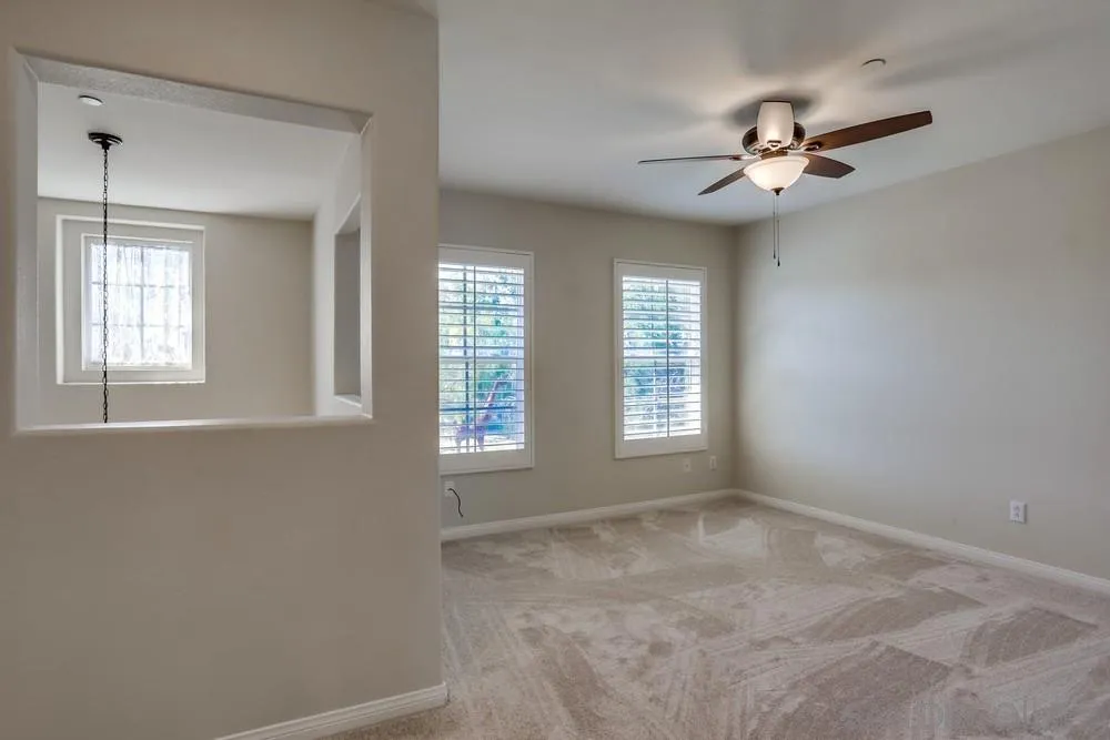 710 Greyfield Court Fallbrook, CA 92028 - Photo 22 of 28 a view of an empty room with a window