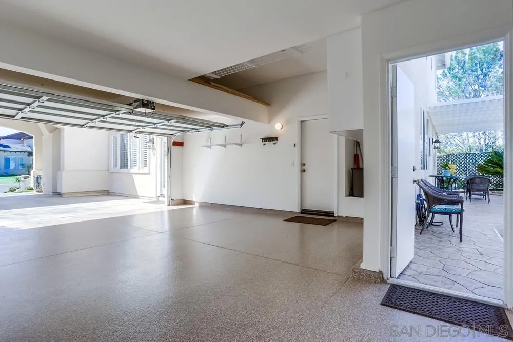 710 Greyfield Court Fallbrook, CA 92028 - Photo 25 of 28 a view of a livingroom with wooden floor and a refrigerator