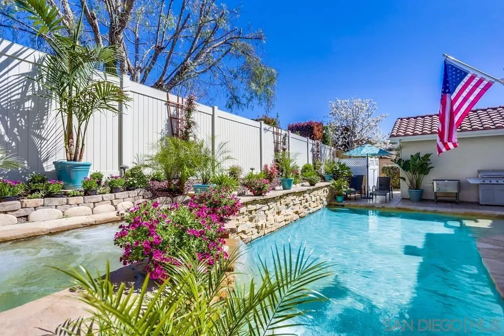 710 Greyfield Court Fallbrook, CA 92028 - Photo 6 of 28 a view of a house with swimming pool and sitting area