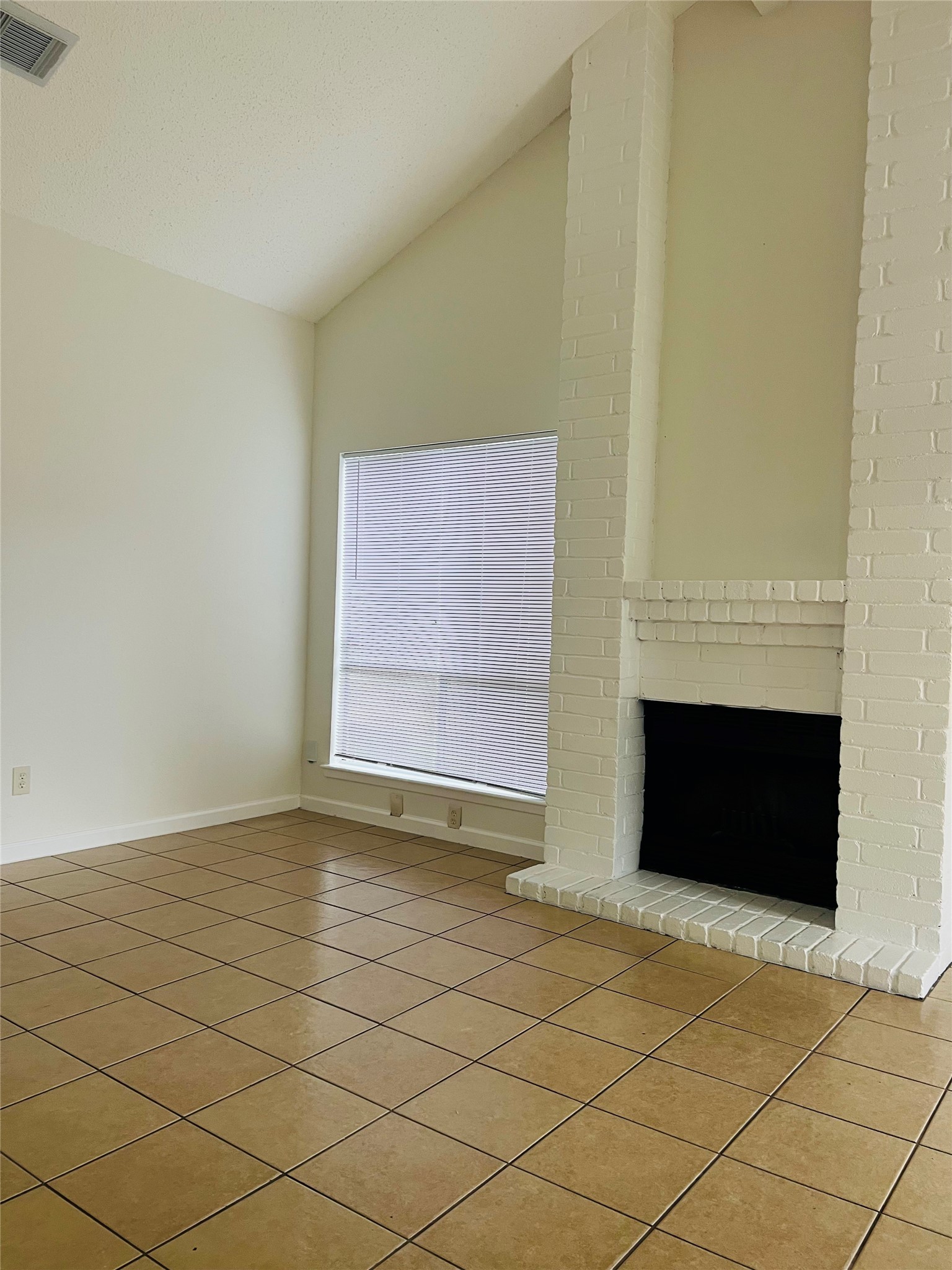 3739 Varla Lane Houston, TX 77014 - Photo 16 of 33 a view of empty room with wooden floor and fireplace
