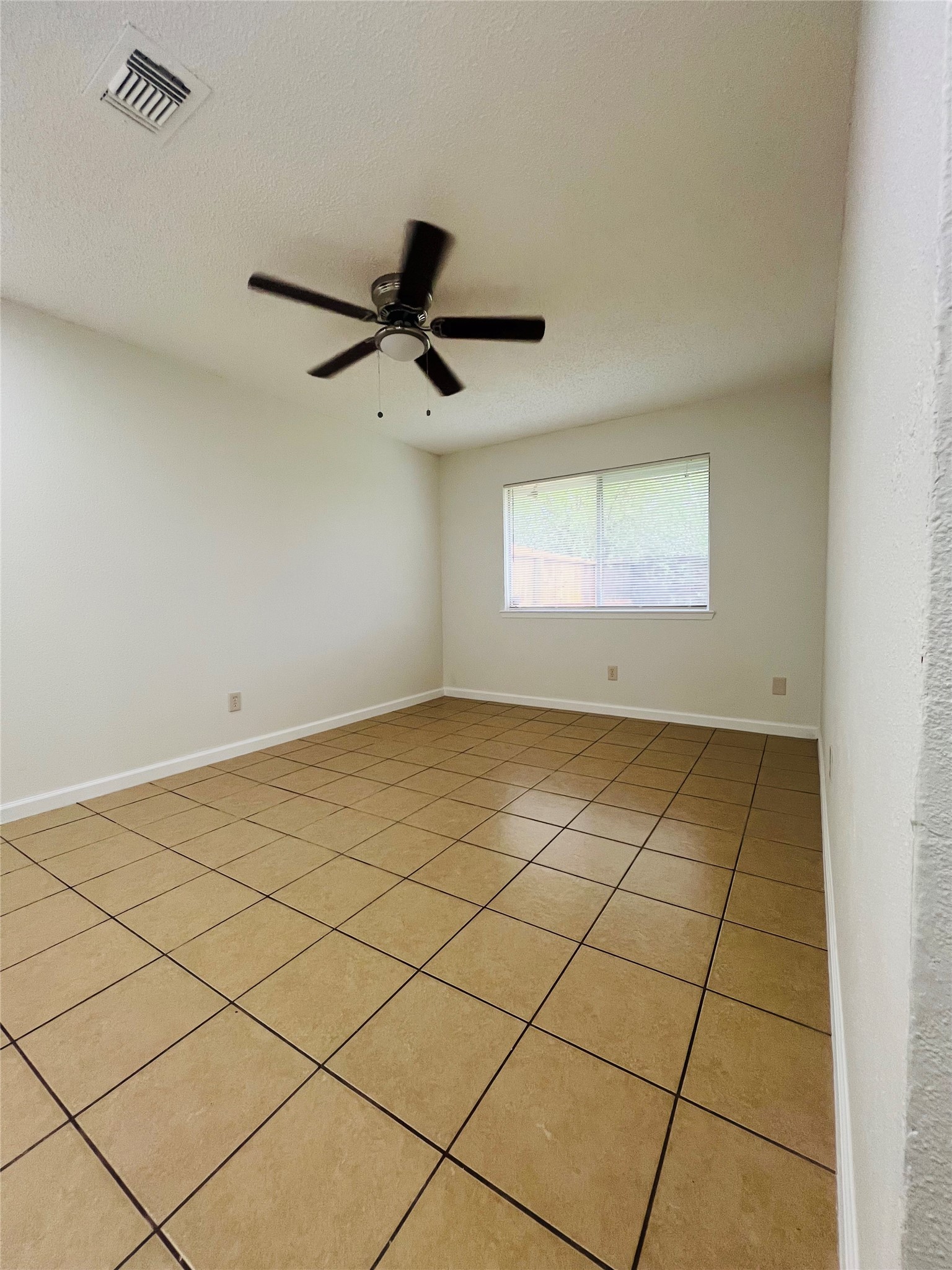 3739 Varla Lane Houston, TX 77014 - Photo 17 of 33 a view of an empty room and a window