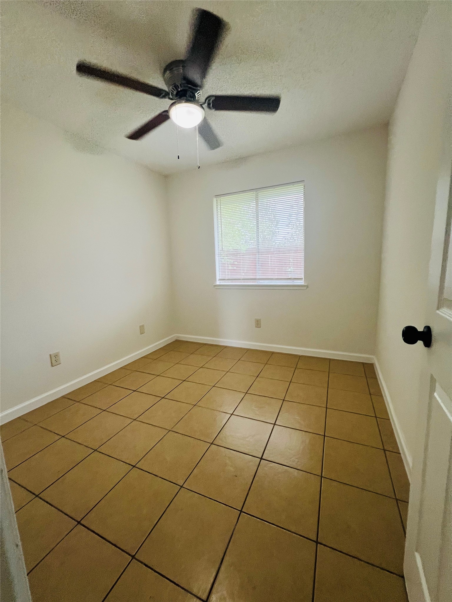 3739 Varla Lane Houston, TX 77014 - Photo 19 of 33 a view of a room with a white cabinet and a view of a room