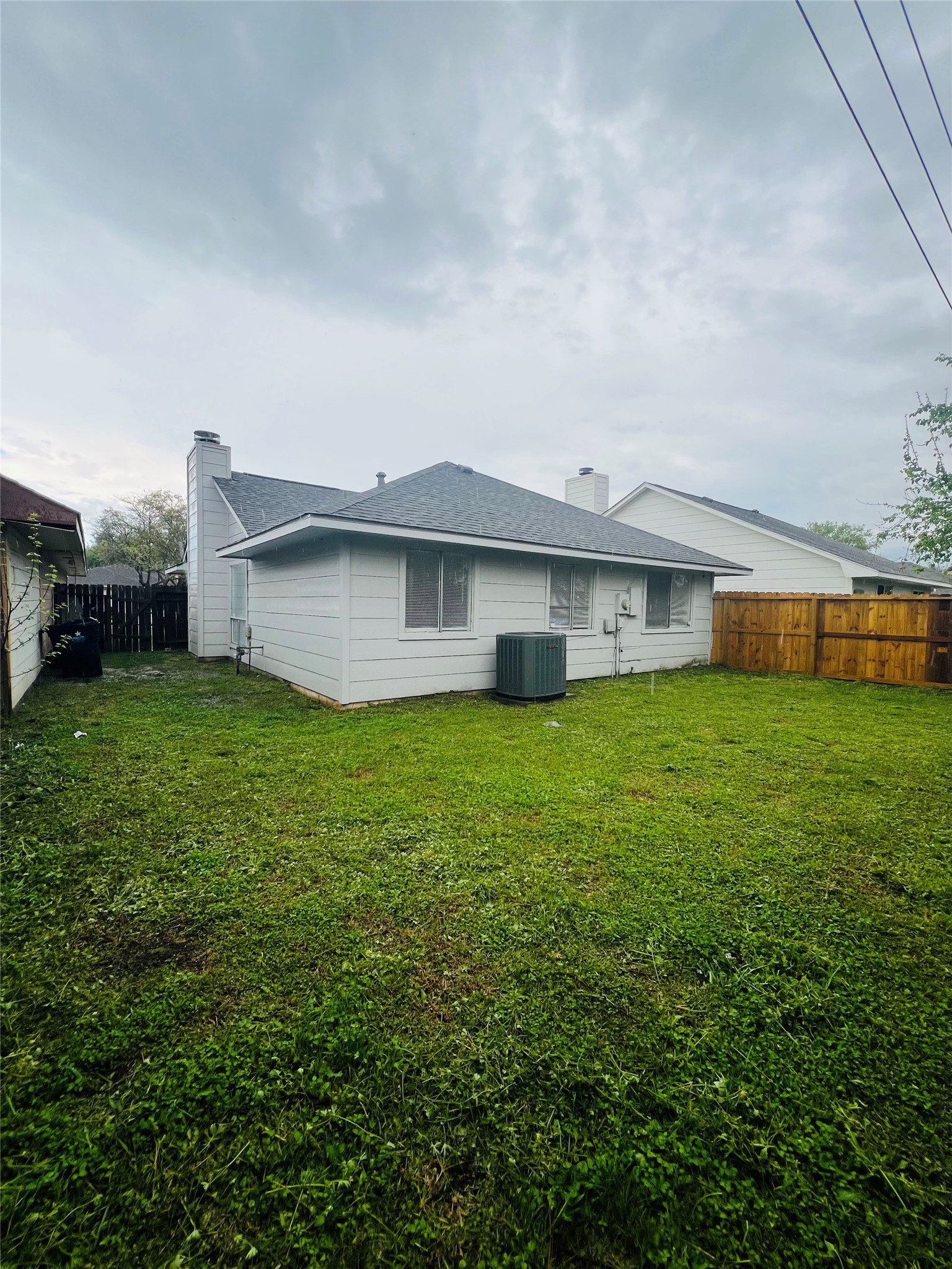 3739 Varla Lane Houston, TX 77014 - Photo 28 of 33 a view of a house with a big yard potted plants and large tree