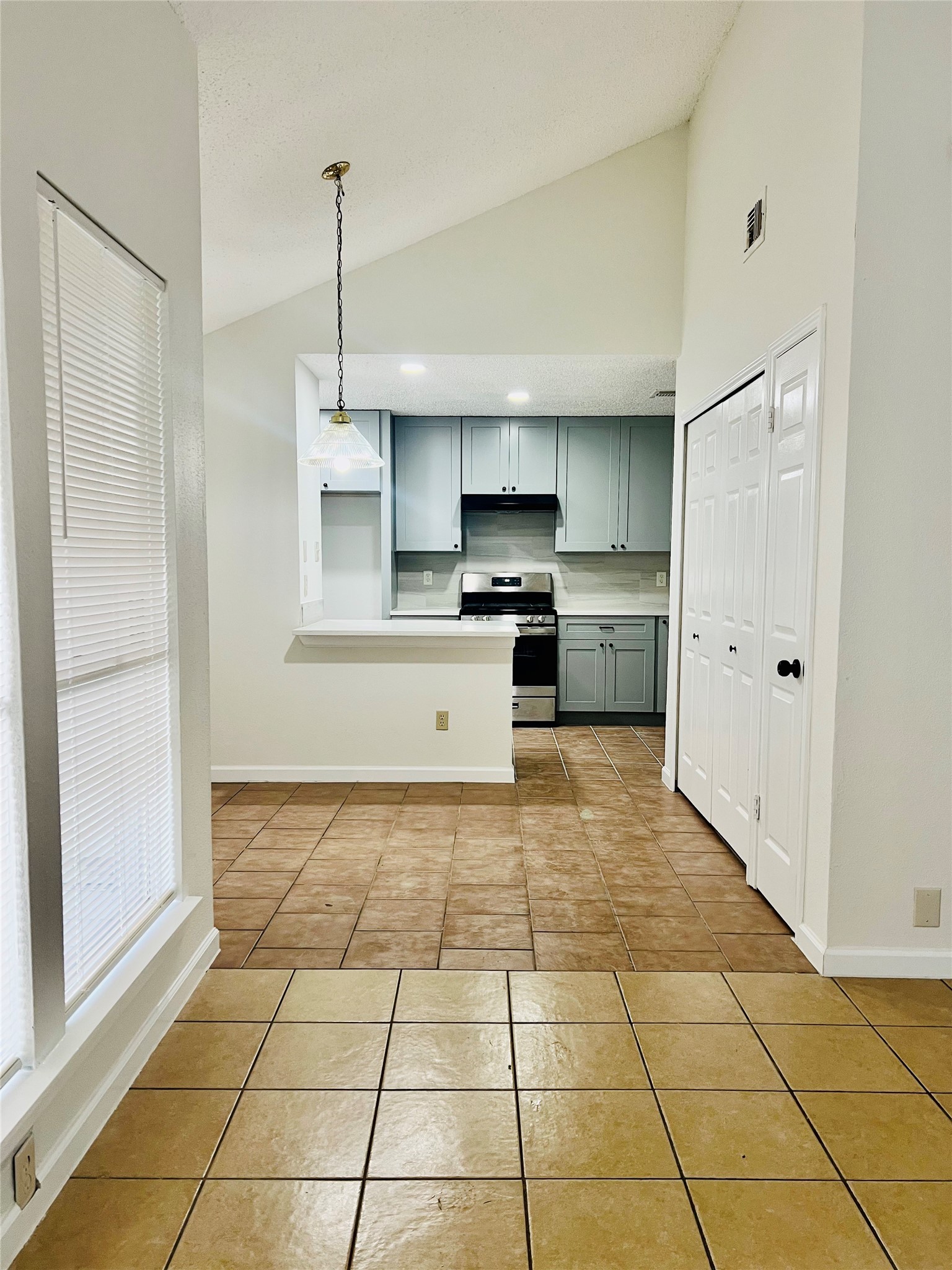 3739 Varla Lane Houston, TX 77014 - Photo 6 of 33 a kitchen with stainless steel appliances granite countertop a refrigerator and a stove top oven