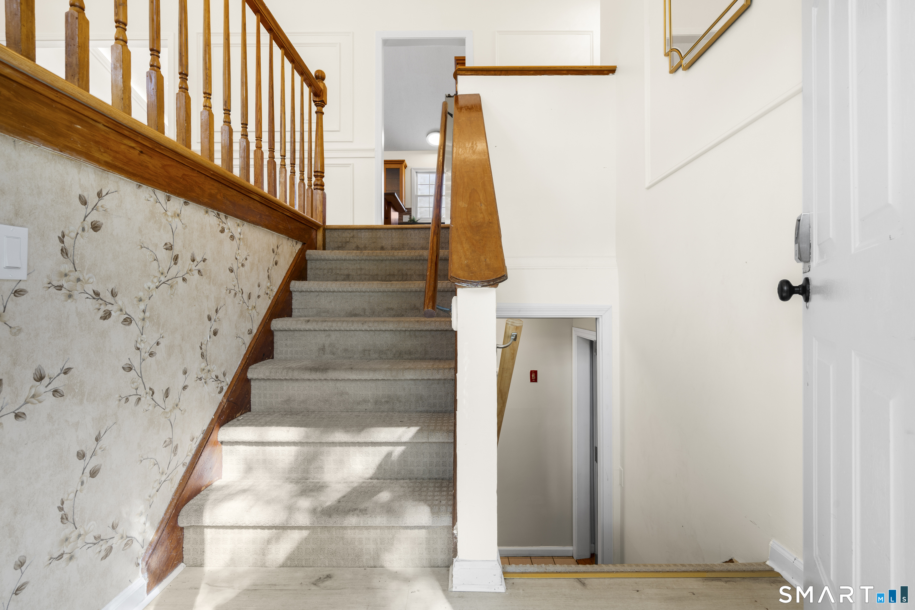 39 Joseph Lane Hamden, CT 06514 - Photo 12 of 40 a view of entryway with wooden floor