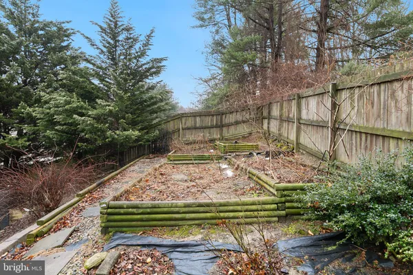 a view of a backyard with a small pool