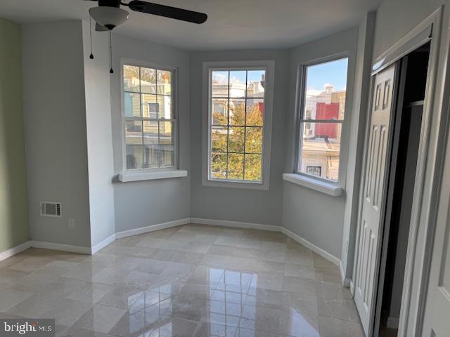 5547 Broomall Street Philadelphia, PA 19143 - Photo 4 of 17 a view of an empty room with a window
