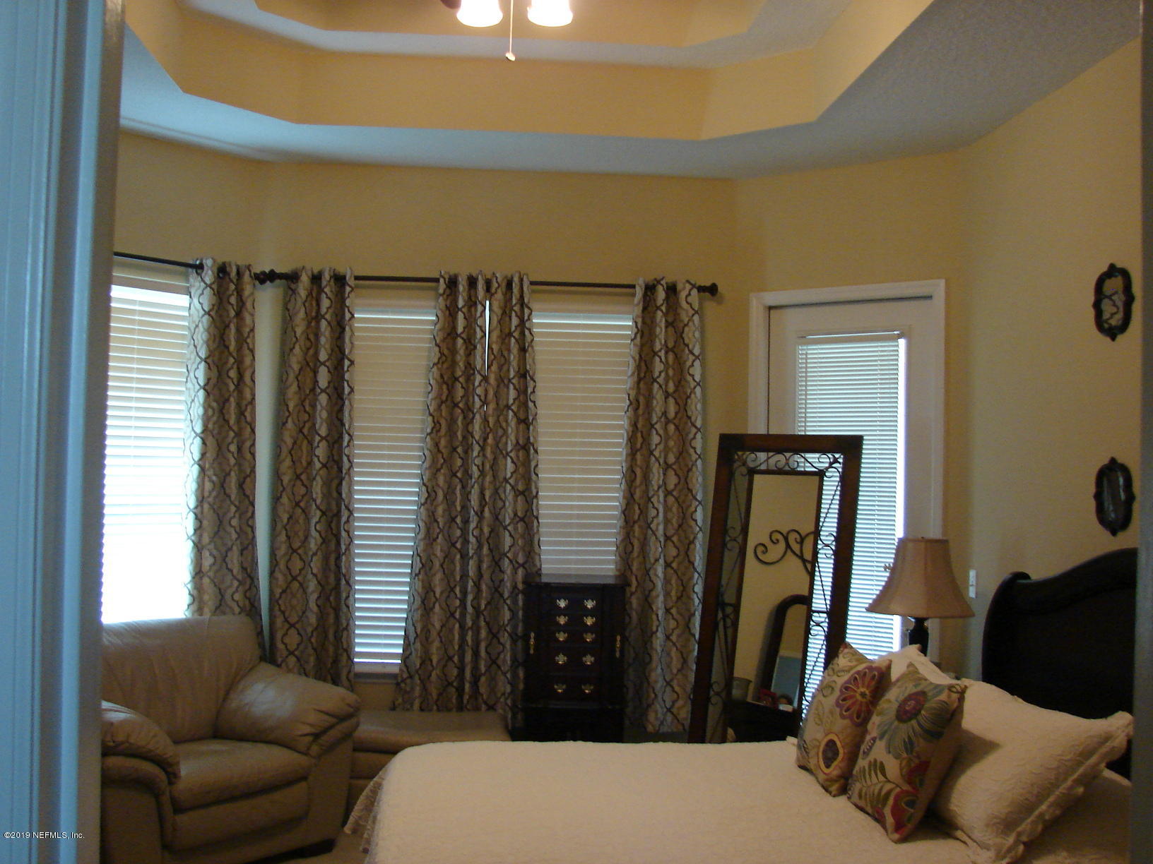1535 Royal County Drive Jacksonville, FL 32221 - Photo 17 of 38 a living room with furniture and a window