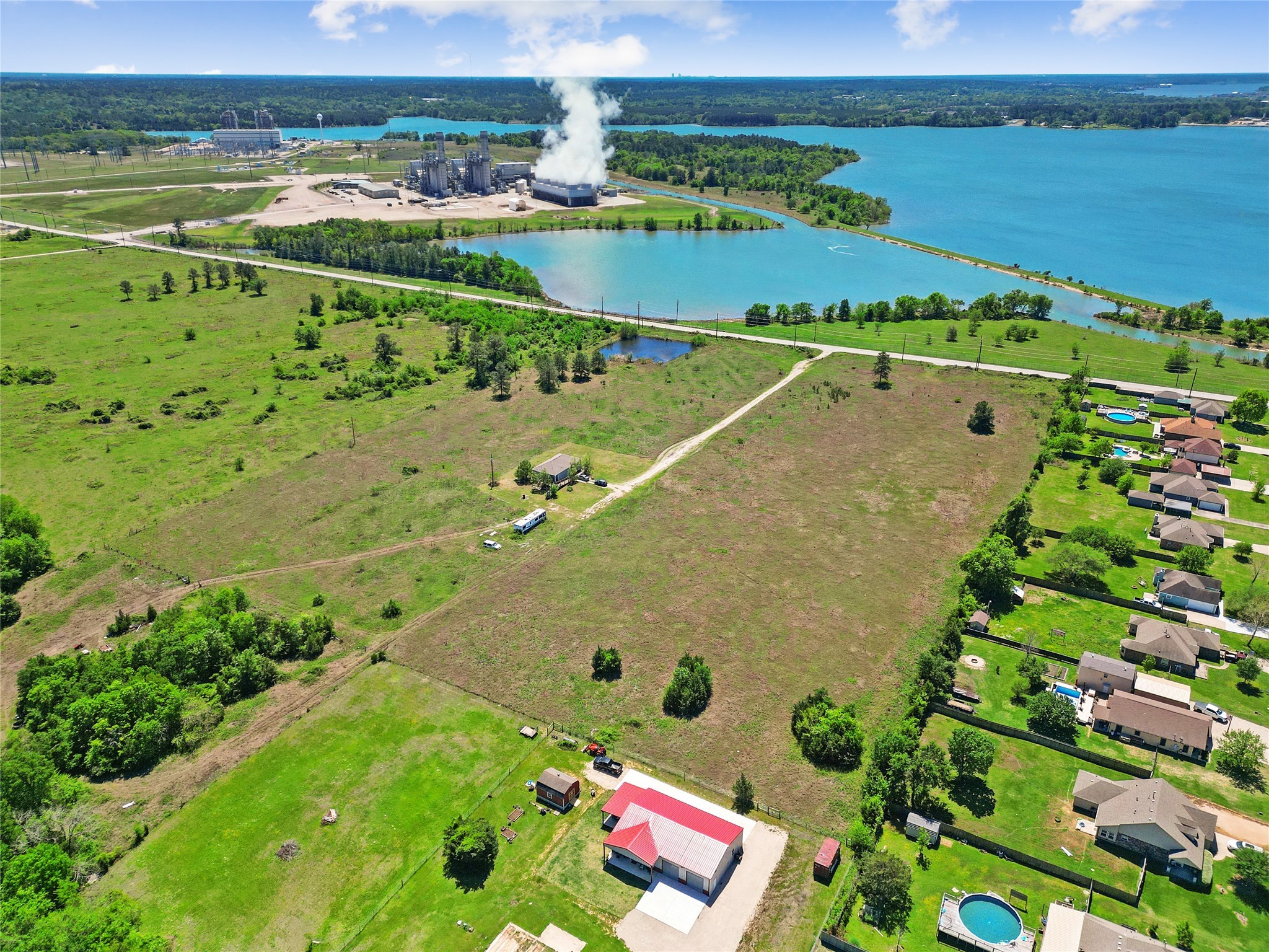 11242 Longstreet Road Willis, TX 77318 - Photo 9 of 10 a view of a city