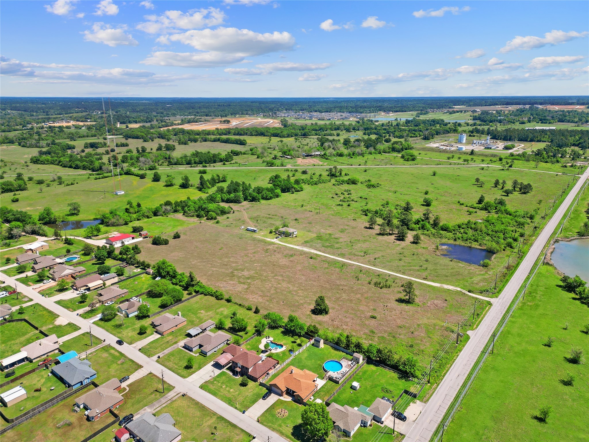 11242 Longstreet Road Willis, TX 77318 - Photo 10 of 10 a view of a city