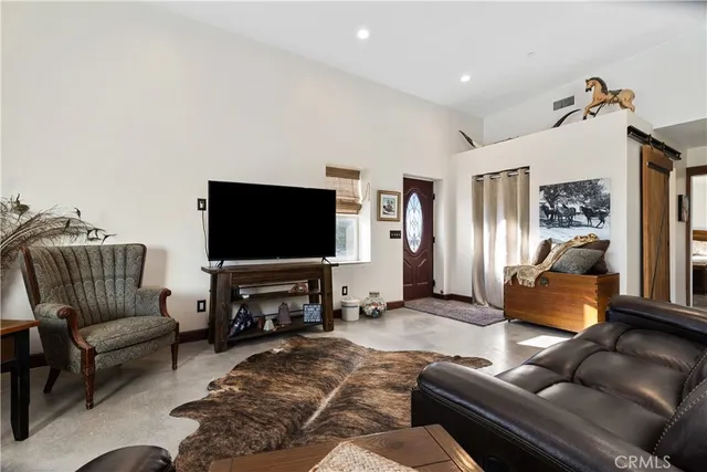a kitchen with cabinets and stainless steel appliances