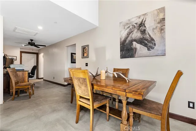 a bedroom with furniture and flat screen tv