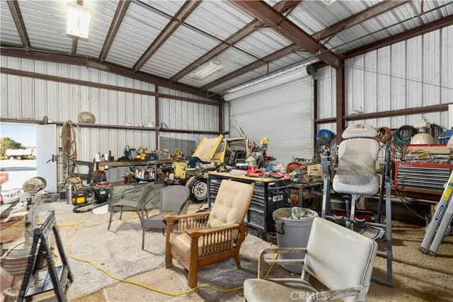 an aerial view of a swimming pool with mountain view