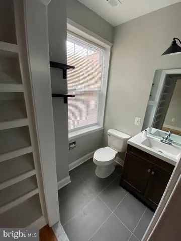 a bathroom with a sink and a toilet