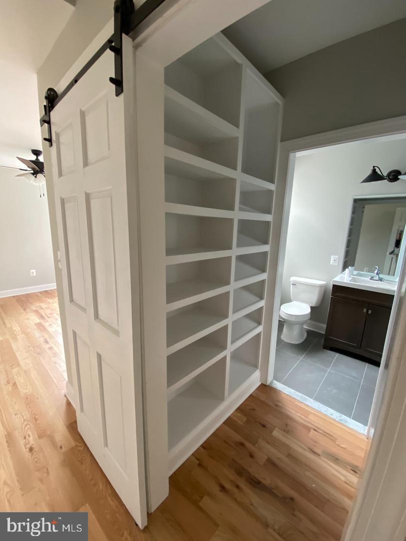 325 East 21st Street Baltimore, MD 21218 - Photo 5 of 28 a view of a living room with a furniture and a fireplace