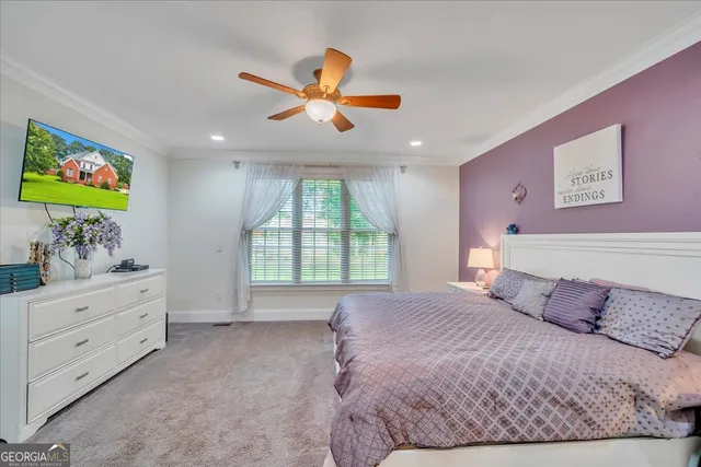 a bathroom with a tub and shower