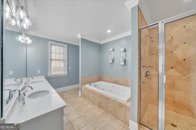 a bathroom with a sink double vanity and a mirror