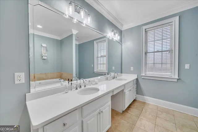 a kitchen with stainless steel appliances granite countertop a refrigerator sink and cabinets