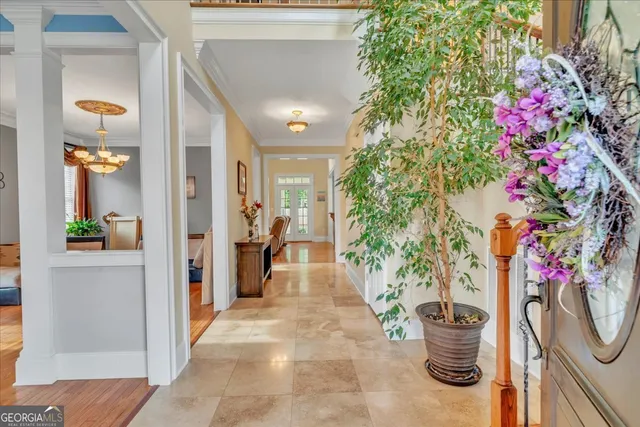 a view of living room filled with furniture and window