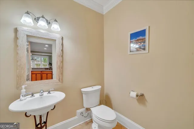 a front view of a house with entryway and stairs