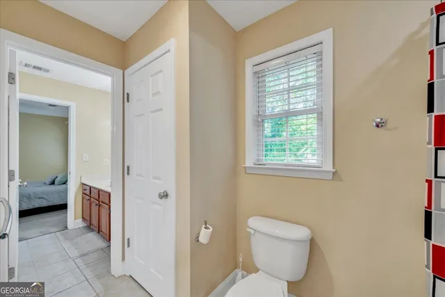 a front view of a house with a yard and porch