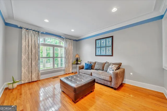 a living room with furniture and a table