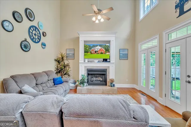 a view of a livingroom with wooden floor