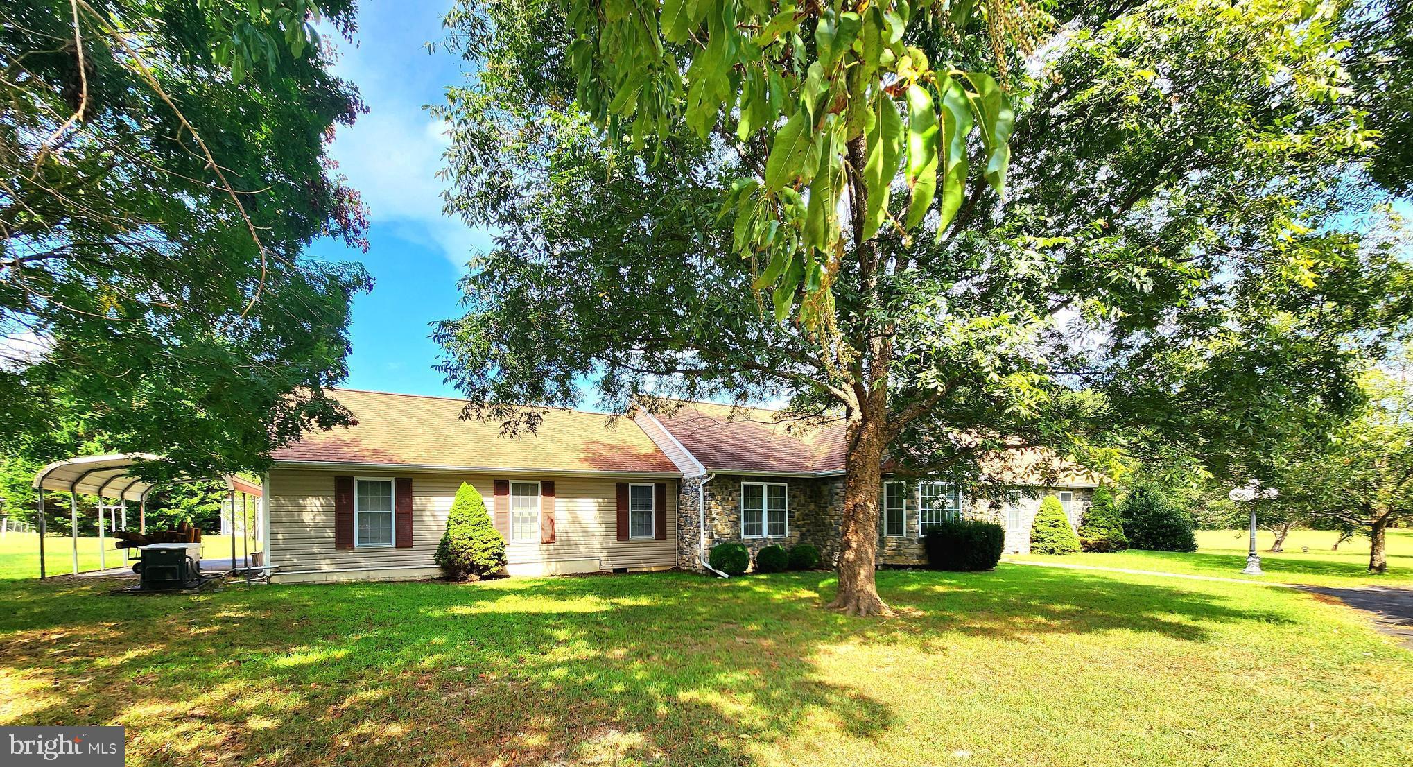 13092 Pullen Loop King George, VA 22485 - Photo 2 of 45 Mature trees provide shading to the home