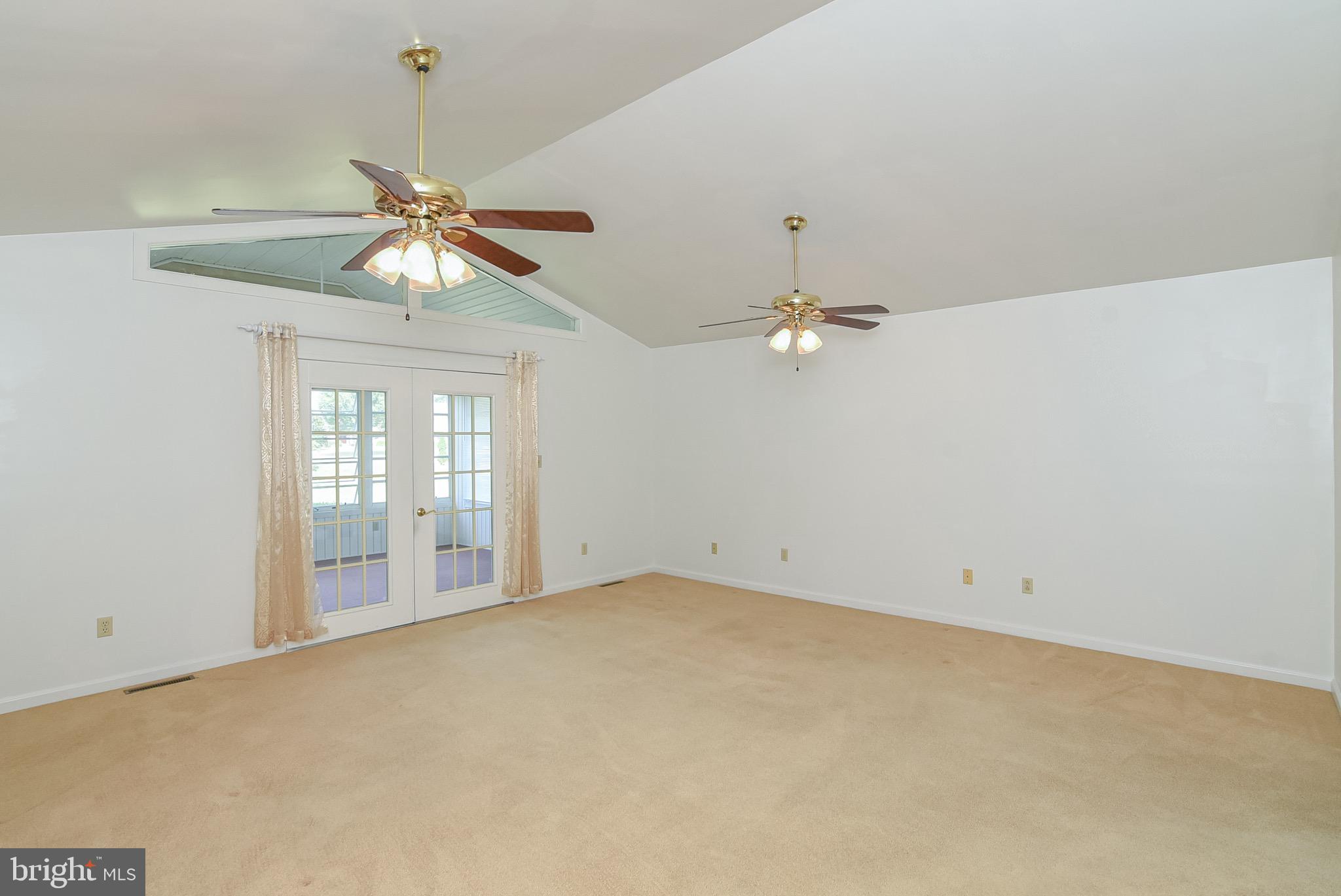 13092 Pullen Loop King George, VA 22485 - Photo 34 of 45 Open the sunroom doors for more entertaining area