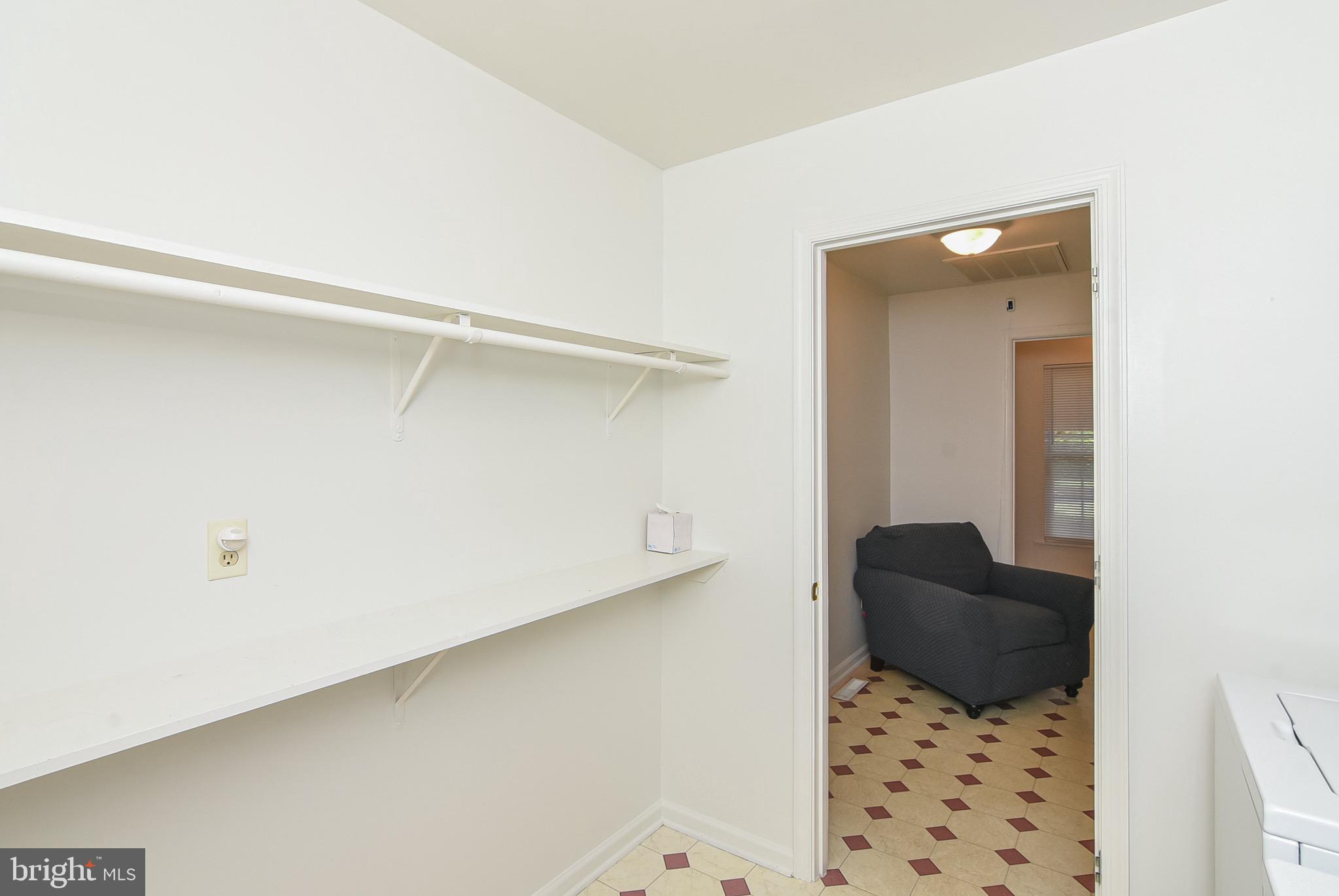 13092 Pullen Loop King George, VA 22485 - Photo 44 of 45 Shelving in utility room