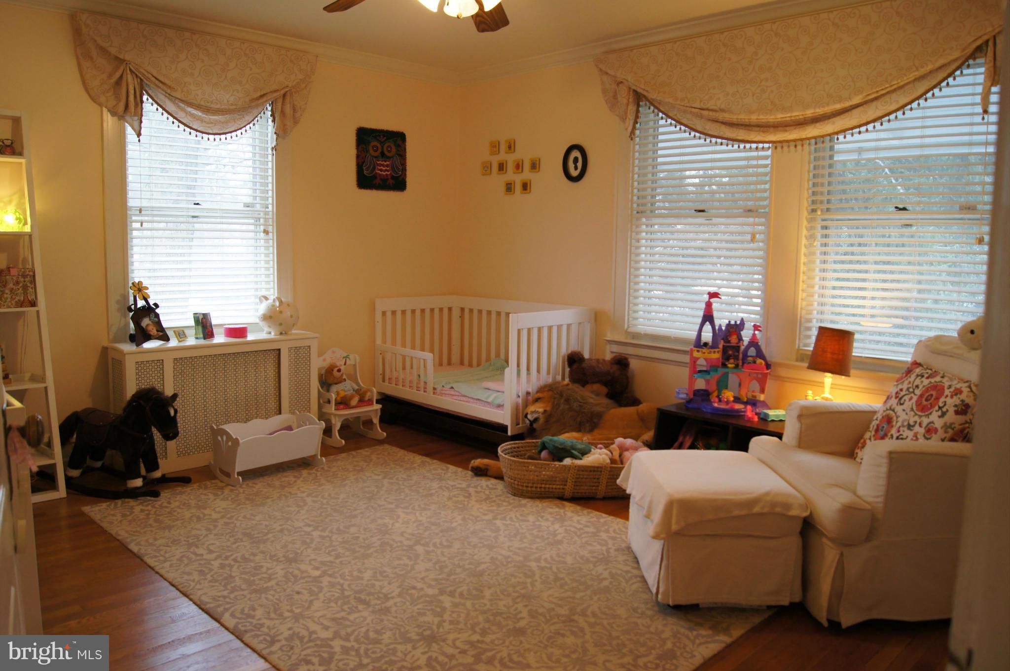 412 Hawthorn Road Baltimore, MD 21210 - Photo 19 of 30 Bedroom two is warm and inviting.