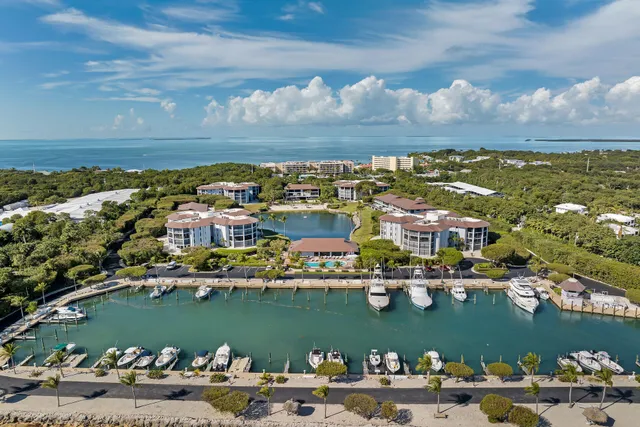 a view of swimming pool with outdoor seating