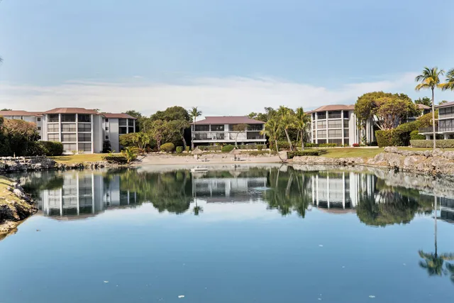 a view of multiple houses with a street