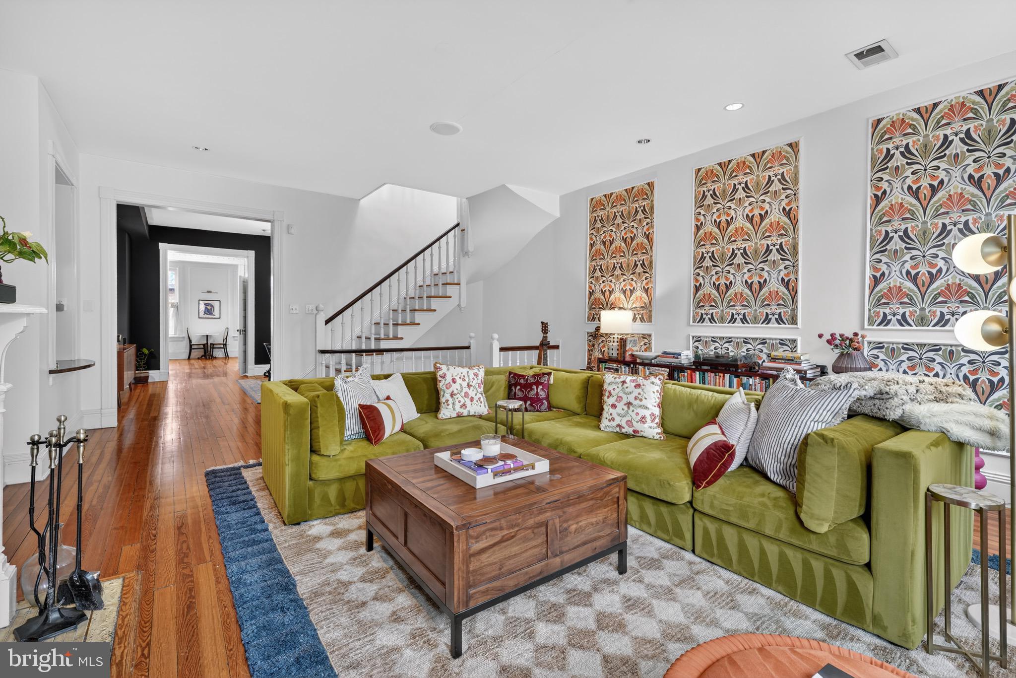 1731 Riggs Place Northwest, Unit 1 Washington, DC 20009 - Photo 19 of 20 a living room with furniture and a large window