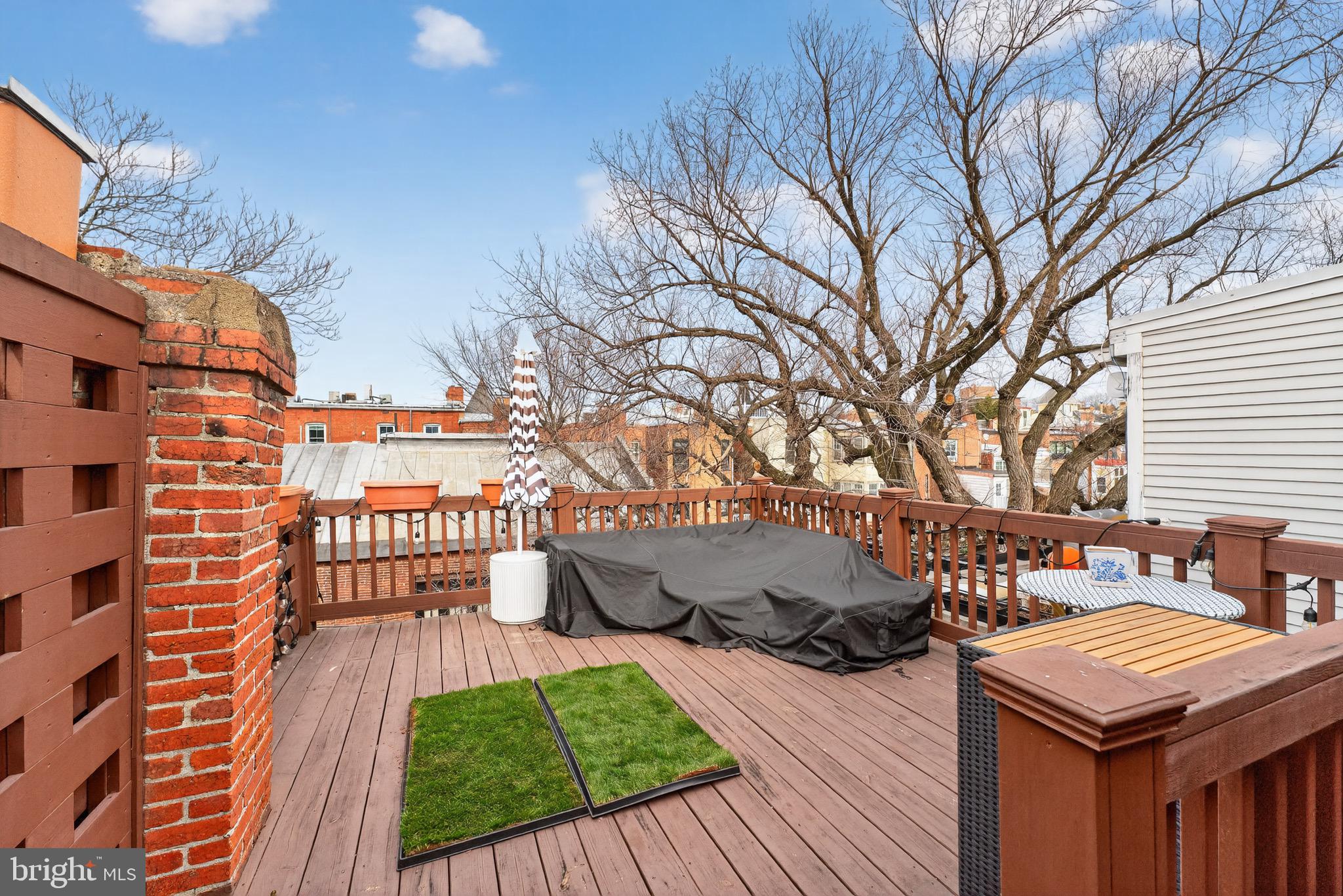 1731 Riggs Place Northwest, Unit 1 Washington, DC 20009 - Photo 20 of 20 a view of a house with backyard and sitting area