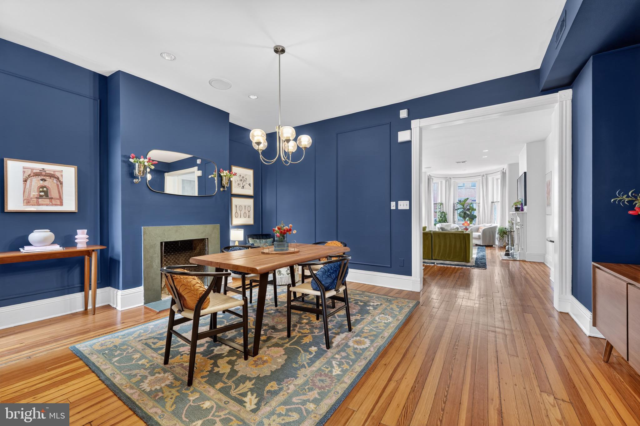 1731 Riggs Place Northwest, Unit 1 Washington, DC 20009 - Photo 10 of 20 a view of a dining room with furniture and wooden floor